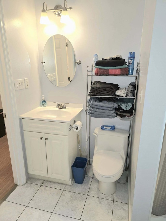 9489 Sidneys Rd, Round O, SC 29474 - bathroom with vanity, toilet, and tile patterned flooring