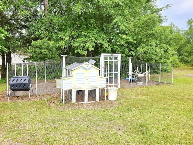 9489 Sidneys Rd, Round O, SC 29474 - view of grassy yard with exterior structure and an outbuilding