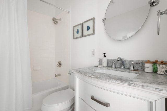 bathroom featuring toilet, vanity, and shower / tub combo with curtain