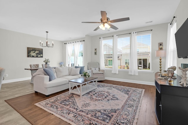 101 Patterson Ave, Goose Creek, SC 29445 - living area with a chandelier, a ceiling fan, and wood finished floors