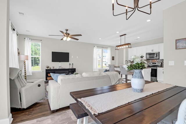 101 Patterson Ave, Goose Creek, SC 29445 - dining room featuring a chandelier, recessed lighting, wood finished floors, and a ceiling fan