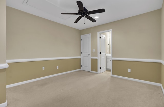 empty room with light carpet and ceiling fan