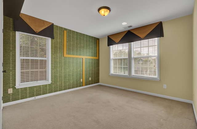 view of carpeted spare room