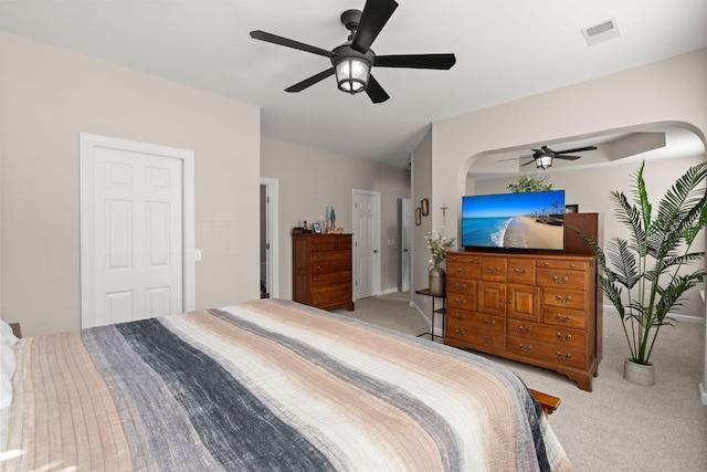 carpeted bedroom with ceiling fan