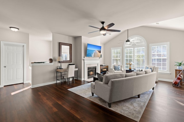 living room featuring ceiling fan, lofted ceiling, and dark hardwood / wood-style flooring