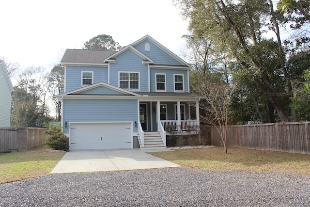 view of front facade with a porch, concrete driveway, fence, and an attached garage