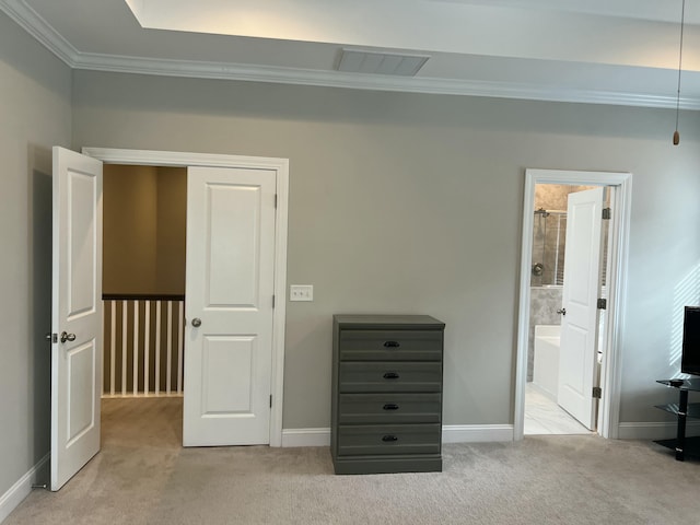 unfurnished bedroom with light carpet, visible vents, and baseboards