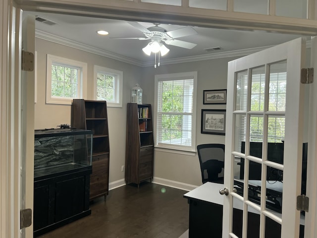 home office featuring dark wood-style floors, visible vents, crown molding, and baseboards