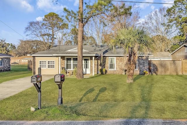 ranch-style house featuring a front lawn