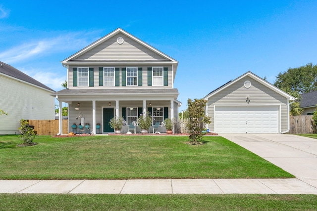 view of front of home featuring a front yard and a garage