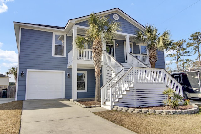 view of front of property with a garage and covered porch