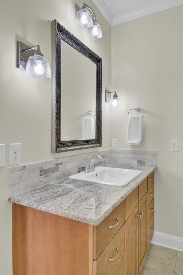 bathroom with vanity, tile patterned floors, and ornamental molding