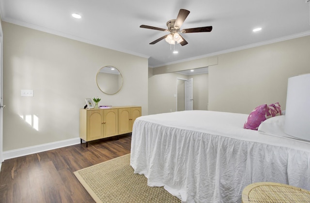 bedroom with dark hardwood / wood-style flooring, crown molding, and ceiling fan