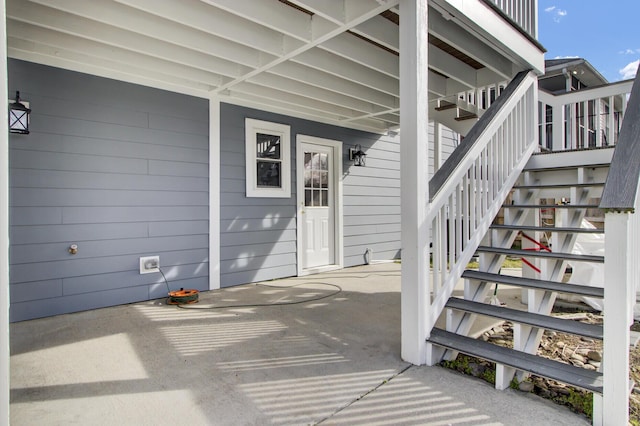 entrance to property featuring a patio