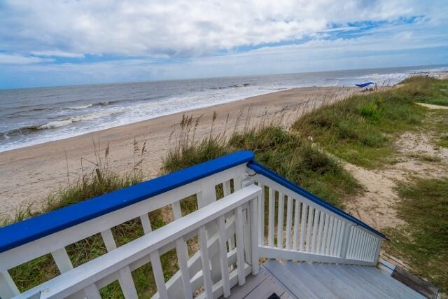 exterior space featuring a beach view