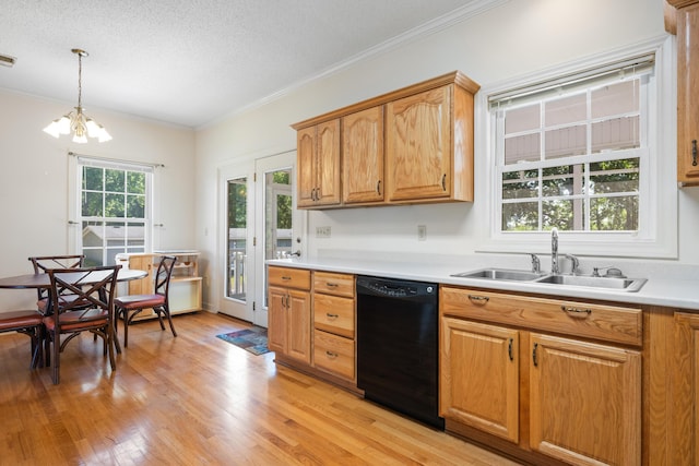 kitchen with light wood-type flooring, dishwasher, a sink, a notable chandelier, and ornamental molding