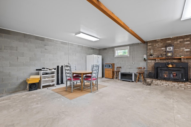 interior space with concrete block wall