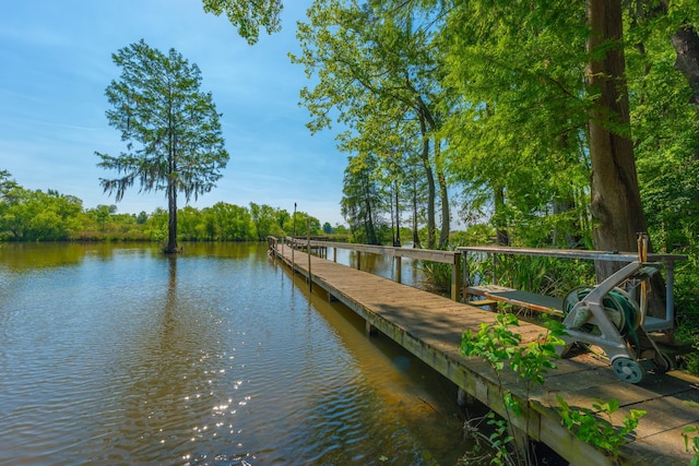 view of dock with a water view