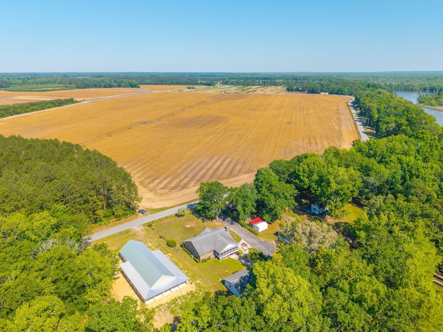 birds eye view of property with a rural view