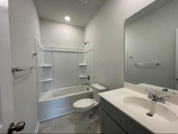 full bathroom with vanity, shower / bathing tub combination, and toilet