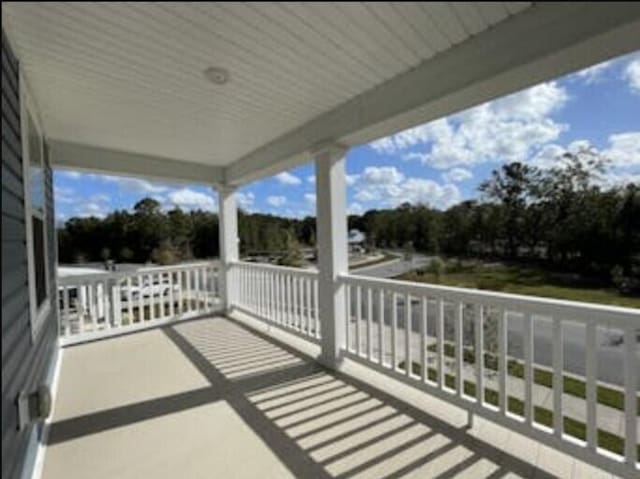 balcony featuring a porch