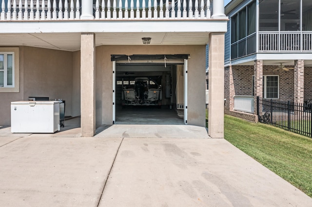 doorway to property featuring a balcony and a garage