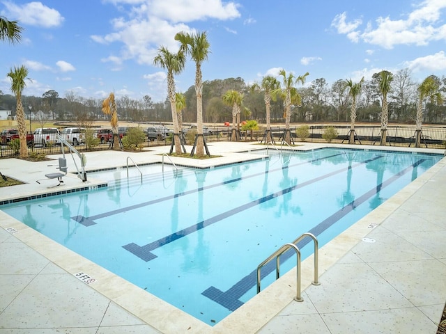 view of pool featuring a patio