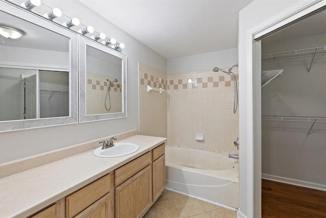 700 Daniel Ellis Dr Unit 11302, Charleston, SC 29412 - bathroom with vanity, tub / shower combination, a spacious closet, and tile patterned floors