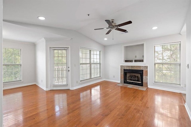 700 Daniel Ellis Dr Unit 11302, Charleston, SC 29412 - unfurnished living room with ceiling fan, wood finished floors, a fireplace, plenty of natural light, and lofted ceiling