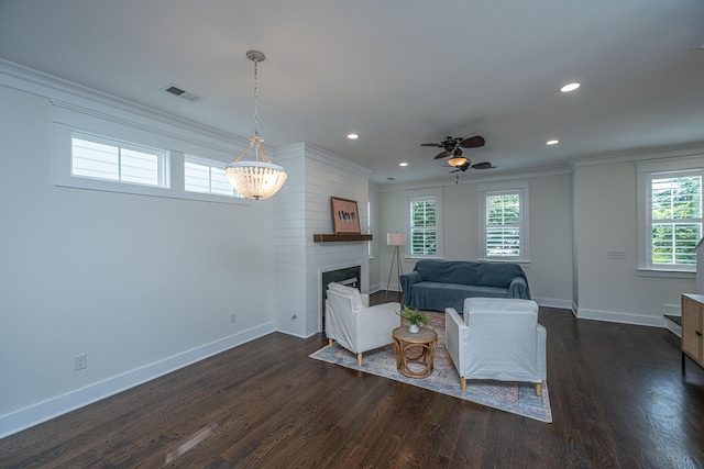 living area with baseboards, ornamental molding, recessed lighting, dark wood-style floors, and a ceiling fan
