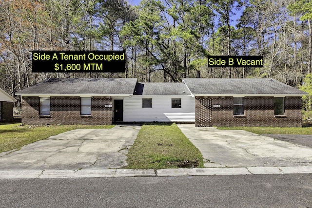 view of building exterior featuring driveway