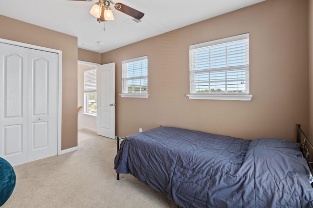251 Coosawatchie St, Summerville, SC 29485 - carpeted bedroom with a closet, ceiling fan, and baseboards
