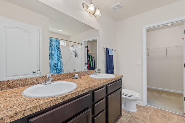 251 Coosawatchie St, Summerville, SC 29485 - full bath with a walk in closet, double vanity, a shower with curtain, and toilet