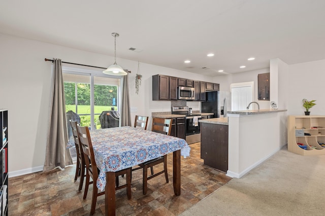 251 Coosawatchie St, Summerville, SC 29485 - dining room with baseboards, recessed lighting, and stone finish floors