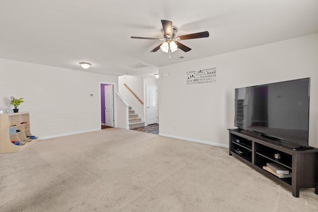 251 Coosawatchie St, Summerville, SC 29485 - unfurnished living room featuring a ceiling fan, carpet floors, and baseboards