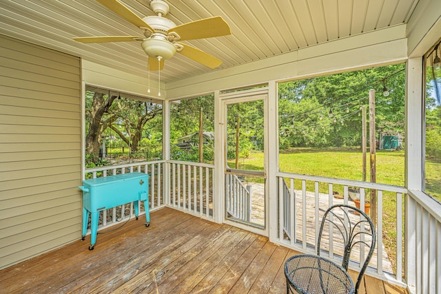 1918 Piper Dr, Charleston, SC 29407 - unfurnished sunroom with a ceiling fan, plenty of natural light, and view of wooded area
