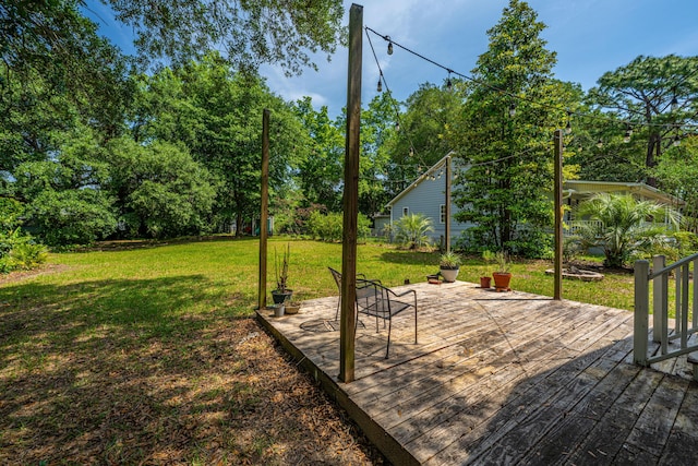 1918 Piper Dr, Charleston, SC 29407 - view of green lawn with a wooden deck