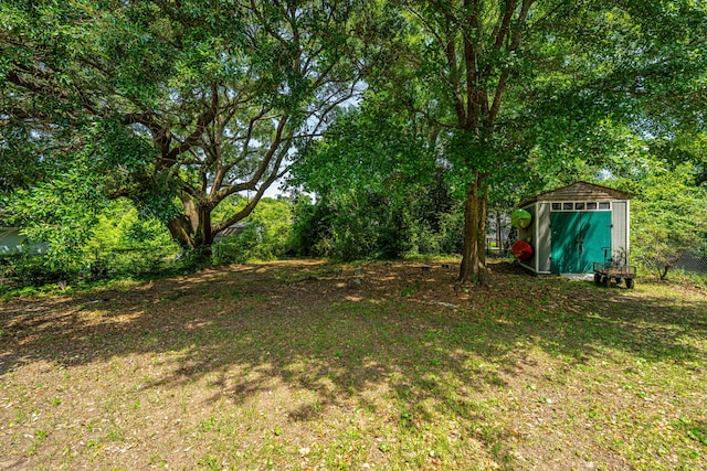 1918 Piper Dr, Charleston, SC 29407 - view of yard with a storage unit and an outdoor structure