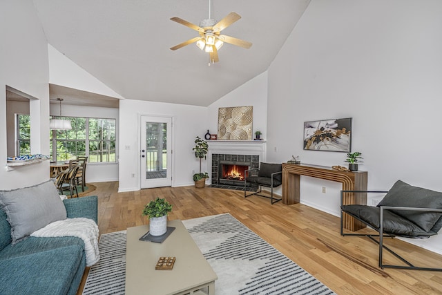 1918 Piper Dr, Charleston, SC 29407 - living area featuring high vaulted ceiling, a ceiling fan, wood finished floors, baseboards, and a tiled fireplace