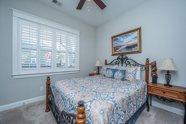 bedroom featuring baseboards, carpet flooring, ceiling fan, and visible vents