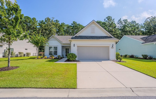 view of front facade featuring a garage and a front lawn