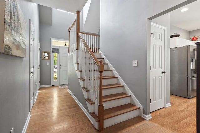 1431 Whispering Oak Trl, Mount Pleasant, SC 29466 - entryway with light wood-style floors, stairway, and recessed lighting