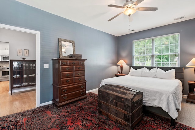 1431 Whispering Oak Trl, Mount Pleasant, SC 29466 - bedroom featuring wood finished floors and ceiling fan