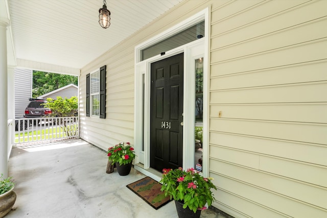 1431 Whispering Oak Trl, Mount Pleasant, SC 29466 - doorway to property featuring covered porch