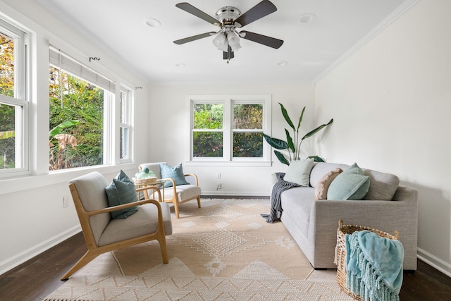 interior space featuring light hardwood / wood-style floors, ornamental molding, and a wealth of natural light