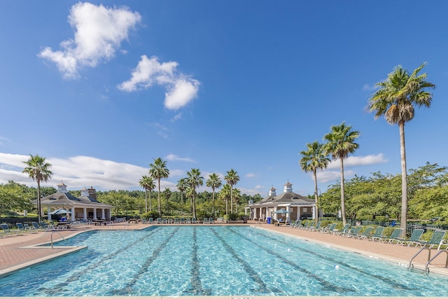 community pool featuring a patio area and a gazebo