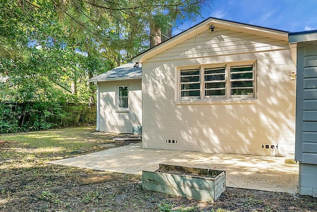 view of home's exterior featuring a patio