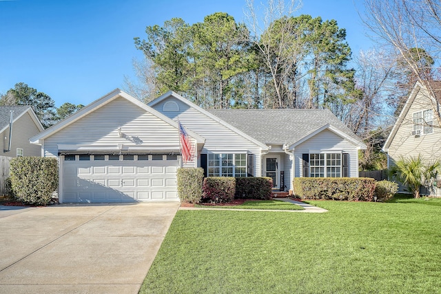 ranch-style home featuring a garage, driveway, a shingled roof, and a front lawn