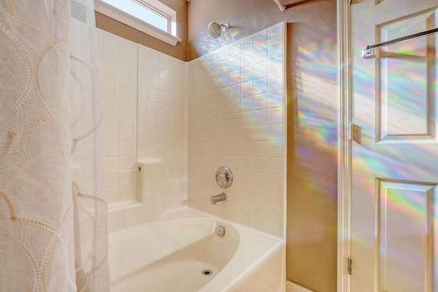 full bathroom featuring shower / tub combo with curtain