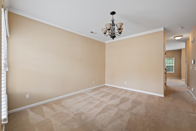 carpeted empty room with crown molding and a notable chandelier